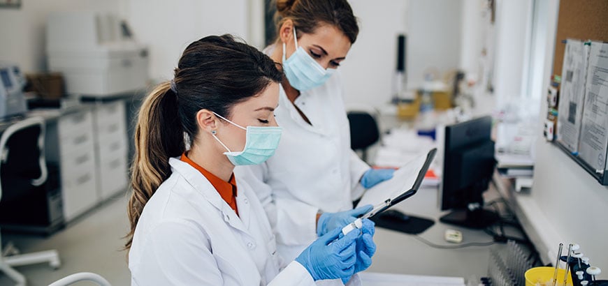 Two pharmacists working in a laboratory