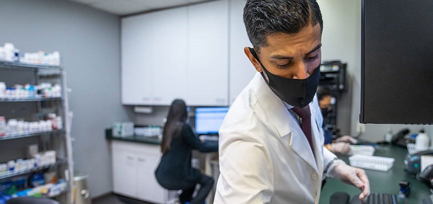 A pharmacist working in a pharmacy